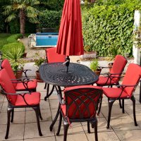 Vista previa: Customer photo of the June 6 seater garden table and april chairs in antique bronze with terracotta cushions and parasol